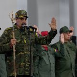 Donald Trump dit avoir eu un échange téléphonique avec Nicolás Maduro, au centre du cliché (archives). KEYSTONE/AP/Ariana Cubillos