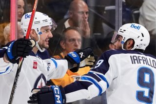 Nino Niederreiter (à gauche) a signé un doublé face aux Predators KEYSTONE/AP/George Walker IV