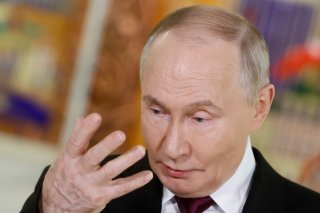 Vladimir Poutine a dit que la Russie "était prête" mais ne souhaitait pas la guerre. KEYSTONE/AP/Sergei Ilnitsky