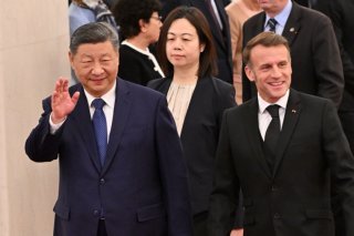 Le président chinois Xi Jinping (à g.) a recu le président français Emmanuel Macron (à dr.) à Pékin. KEYSTONE/EPA/ADEK BERRY / POOL