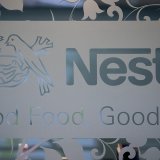 L'imposition minimale de l'OCDE pour les grandes entreprises devrait être reportée d'un an au moins, selon une commission parlementaire (photo d'illustration). KEYSTONE/LAURENT GILLIERON