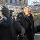 Michel Platini à son arrivée à la Cour d'appel extraordinaire du Tribunal pénal fédéral, lundi à Muttenz (BL). KEYSTONE/EPA/URS FLUEELER