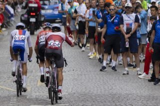 Le passage par Montmartre avait attiré la grande foule lors des JO 2024 KEYSTONE/EPA/ANDRE PAIN