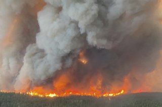 D'importantes fumées dues aux violents feux de forêt au Canada atteignent l'Europe ces derniers jours. KEYSTONE/AP