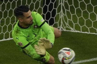 L'arrêt décisif de Diogo Costa. KEYSTONE/AP/Michael Probst