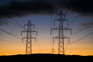 Une ligne à haute tension à Romanel (VD). (Image d'illustration) KEYSTONE/JEAN-CHRISTOPHE BOTT