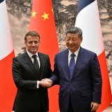 "J'ai vu une volonté du Président Xi de contribuer à la stabilité et à la paix", a assuré Emmanuel Macron. KEYSTONE/AP/Adek Berry
