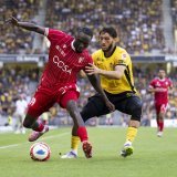 Josias Lukembila (en rouge) s'est rapidement acclimaté au FC Sion.