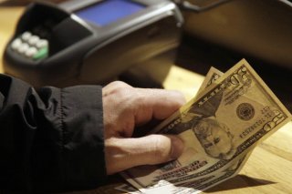 Des droits de douane de 39% et une dépréciation du dollar de 8% ont rendu les exportations suisses environ 50% plus chères pour les acheteurs américains, selon UBS. (archives) KEYSTONE/AP/RICHARD DREW