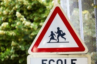 Dès la rentrée 2026, une partie des élèves frontaliers ne seront plus admis dans les écoles genevoises. KEYSTONE/SALVATORE DI NOLFI