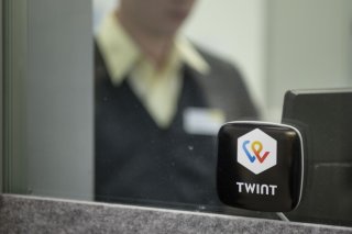 Environ 81% des magasins acceptent le moyen de paiement avec Twint et 84% des boutiques en ligne font de même. (archives) KEYSTONE/CHRISTIAN BEUTLER