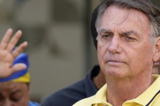 Jair Bolsonaro, qui se déclare innocent et se dit "persécuté", a été placé en résidence surveillée au début août (archives). KEYSTONE/AP/Eraldo Peres