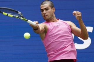 Carlos Alcaraz n'a pas perdu de temps sur le court KEYSTONE/EPA/JOHN G. MABANGLO