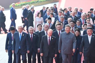 L'ancien conseiller fédéral UDC Ueli Maurer figurait parmi la vingtaine de dirigeants présents sur place. KEYSTONE/EPA XINHUA NEWS AGENCY/XINHUA / SHEN HONG