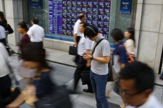 Pékin exige des entreprises de réseaux sociaux qu'elles fassent preuve de modération et contrôlent strictement les contenus afin d'éviter tout ce qui pourrait être considéré comme trop subversif, vulgaire, pornographique ou généralement nuisible. KEYSTONE/AP/SHIZUO KAMBAYASHI