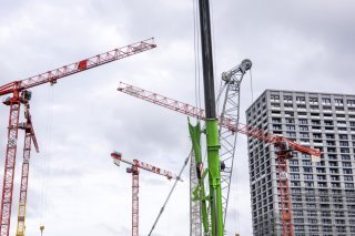 Le travaux du futur quartier Quai Vernets sont en cours. La tour de 86 mètres de haut est déjà sortie de terre. Le nouveau bâtiment de l'UNIGE sera érigé dans ce périmètre (archives). KEYSTONE/SALVATORE DI NOLFI