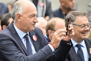 Les conseillers d'Etat Chrsitophe Darbellay et Franz Ruppen, ainsi que leurs collègues du gouvernement valaisan ont participé au grand cortège de l'Olma, le 11 octobre dernier (photo d'archives). KEYSTONE/WALTER BIERI