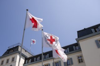 Les proches de disparus réunis par le Comité international de la Croix-Rouge (CICR) ont dénoncé les effets légaux et financiers auxquels ils sont confrontés (archives). KEYSTONE/MARTIAL TREZZINI