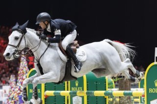 Kent Farrington et sa jument Greya ont réussi deux excellents passages à Genève. KEYSTONE/CYRIL ZINGARO