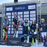 Armand Marchant, sur la plus haute marche du podium lors du slalom de Coupe d'Europe à Crans-Montana