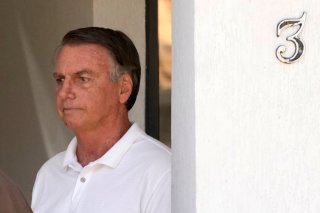 L'ancien président brésilien Jair Bolsonaro purge actuellement une peine de 27 ans de prison pour avoir orchestré un coup d'Etat (archives). KEYSTONE/AP/ERALDO PERES