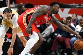 Kyshawn George (à gauche) et les Wizards ont subi la loi de Zion Williamson et des Pelicans vendredi KEYSTONE/AP/John McDonnell