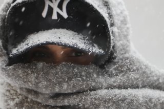 Les autorités ont averti que le froid devrait durer toute la semaine. Ici, un passant emmitouflé à New York pris en photo dimanche. KEYSTONE/AP/Heather Khalifa