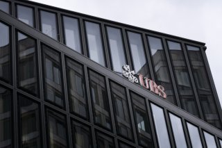 Pour l'ensemble de l'année 2025, le numéro un bancaire helvétique affiche un bénéfice de 7,8 milliards de dollars, en hausse de plus de moitié (+53%) (archives). KEYSTONE/GAETAN BALLY