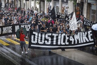 Les manifestants ont exigé que justice soit faite pour Mike, mort lors de son arrestation par la police en 2018.