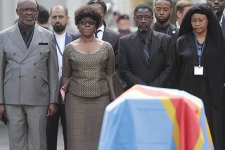 Les enfants de Patrice Lumumba lors d'une cérémonie à Bruxelles lundi.