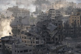 Gaza City sous les bombes (Photo d'illustration). KEYSTONE/AP/Fatima Shbair