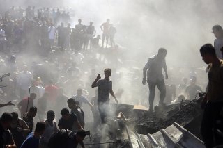 Détresse dans la ville de Khan Younis, au Sud de la bande de Gaza, jeudi. KEYSTONE/AP/Mohammed Dahman