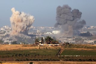 Le ministère de la santé du Hamas a annoncé que 11'078 personnes, dont 4506 enfants, ont été tuées dans les bombardements israéliens sur la bande de Gaza. KEYSTONE/EPA/NEIL HALL